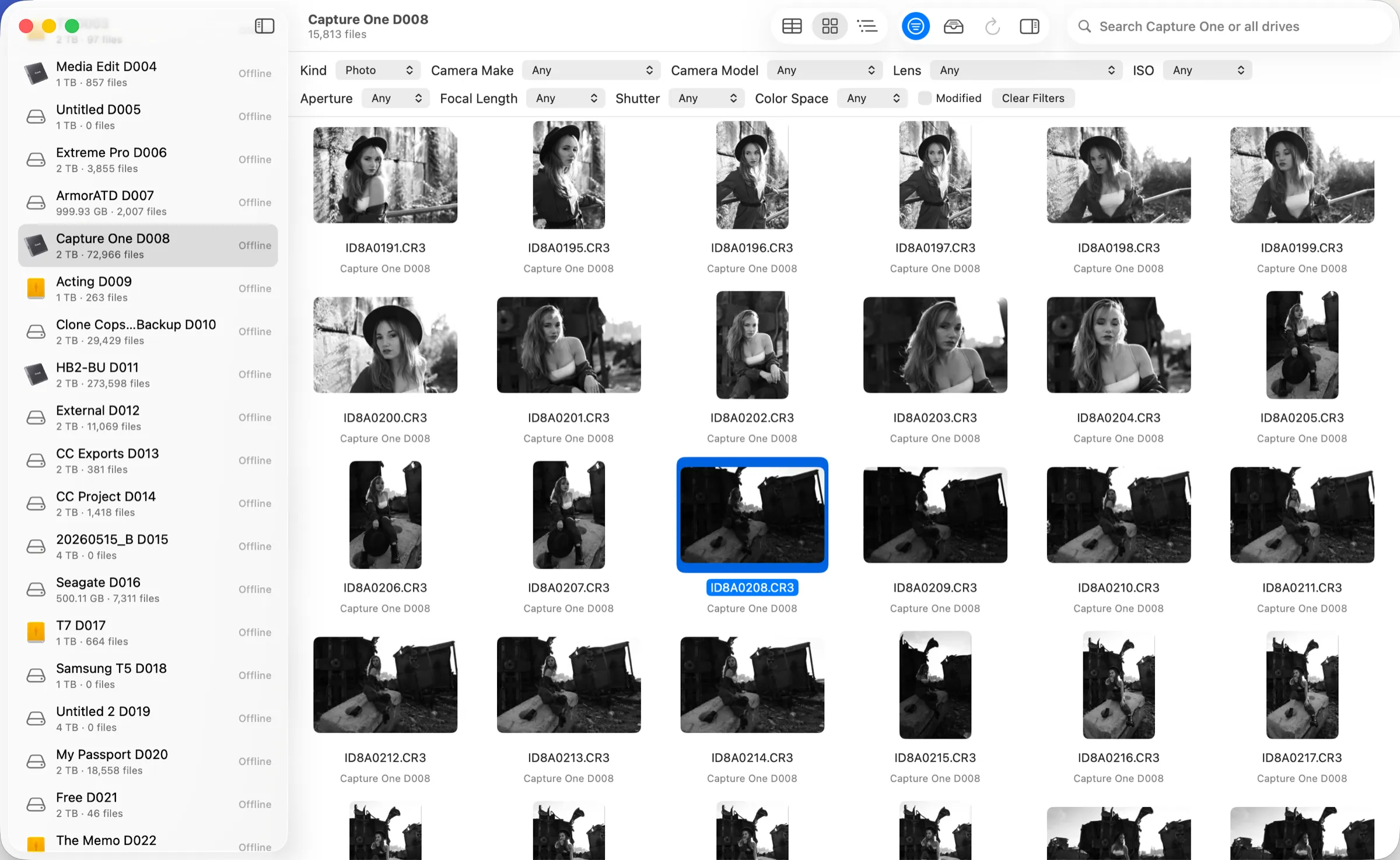DriveIndex showing a drive of photos as a grid of thumbnails, with the list of drives in the sidebar
